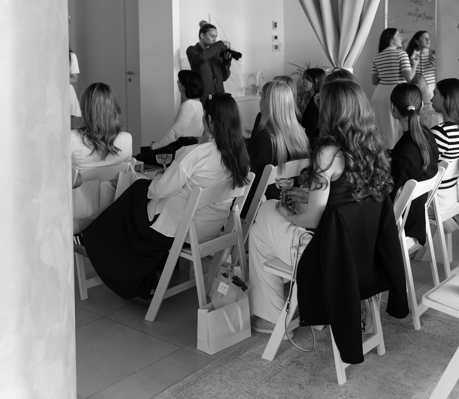 Guests with drinks at a corporate reception